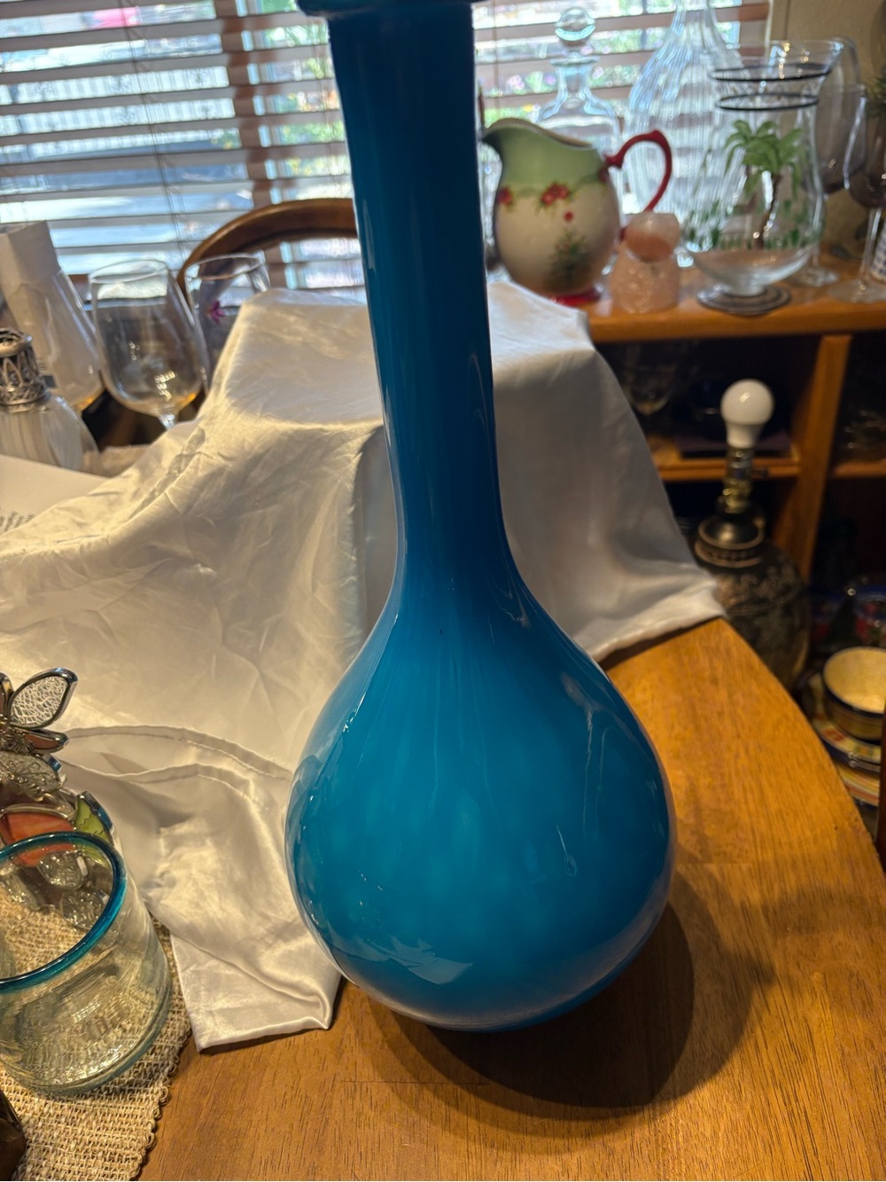 Vintage MCM Italian sky blue art glass genie bottle vase. Cased blue over opaque